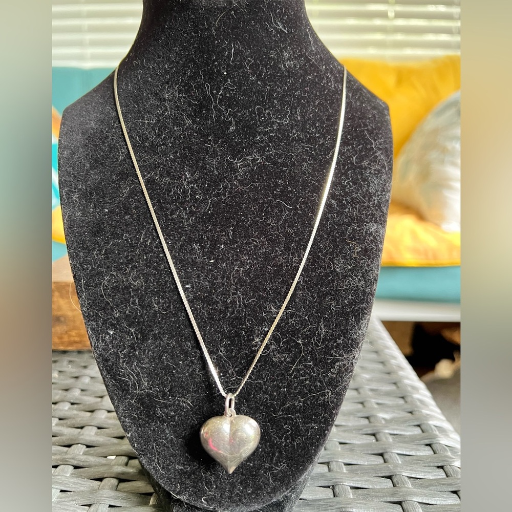 Vintage Sterling silver hollow puffy heart on a sterling silver chain necklace.
